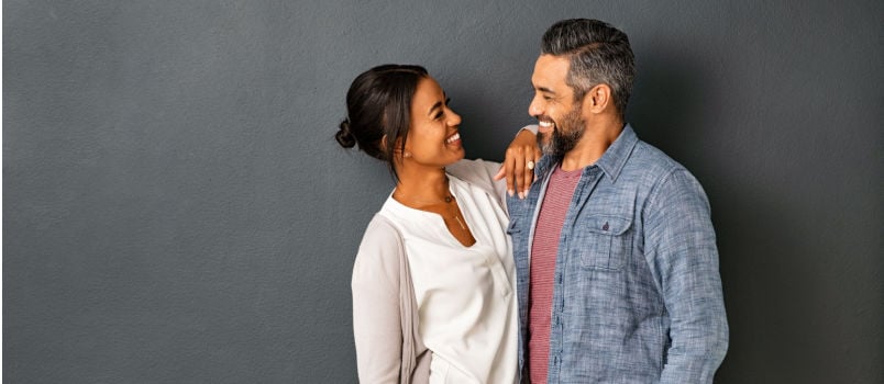 Couple embracing looking at each other