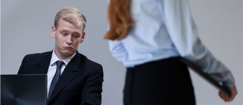 Young boos looking at his secretary