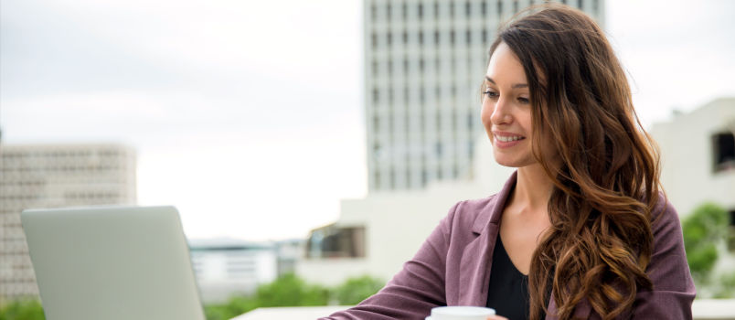 Attractive women working on terrace