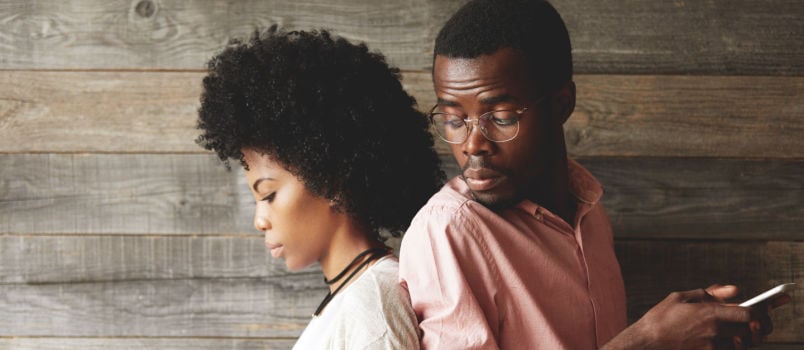 Black hair girl texting