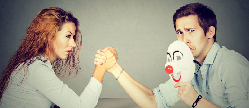 Business people having arm wrestling
