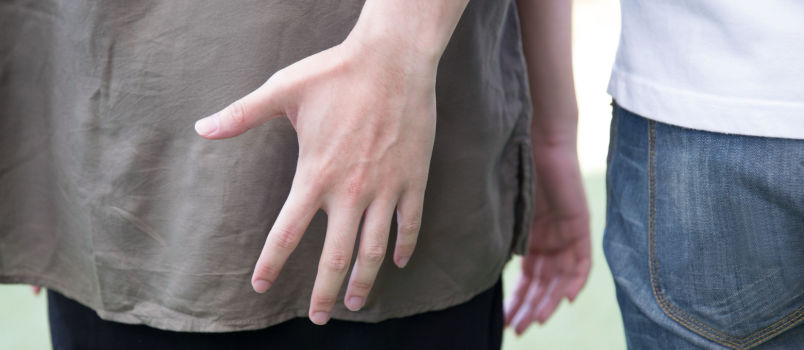 Man touching women bottom