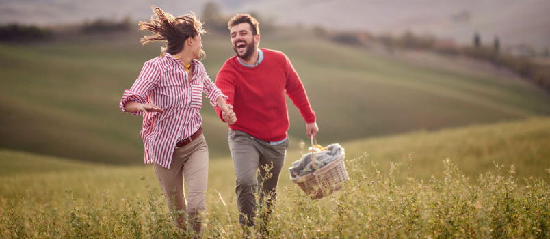 Couple moving in park