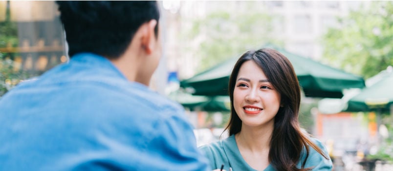 Young asian couple dating in coffee shop