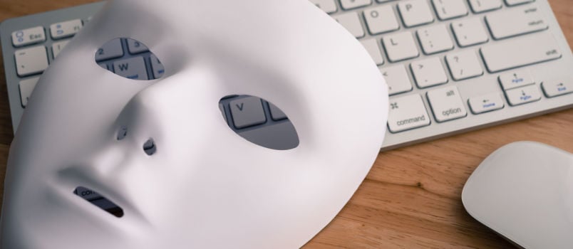 White scary mask over keyboard