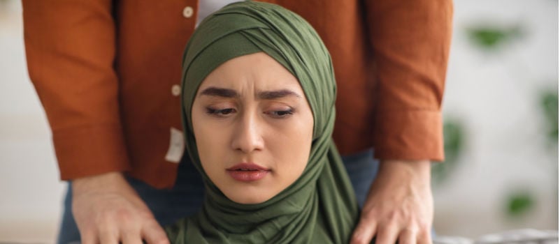 Husband touching her wife