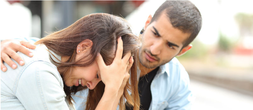 Man consoling women