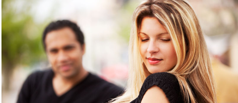 Man and women sitting on the bench