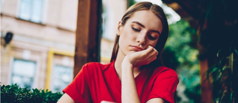 Sad woman siting alone