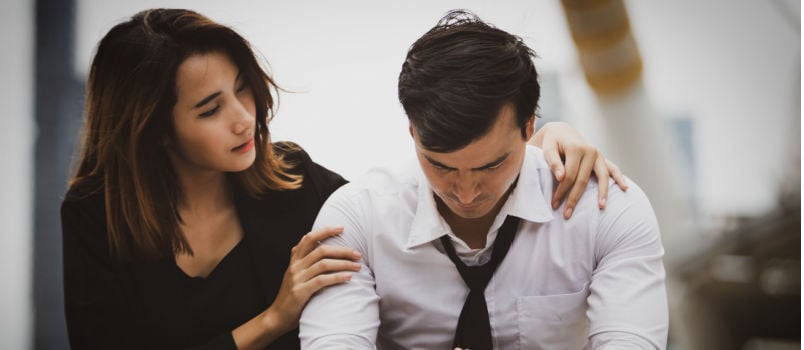 Tired business man sitting