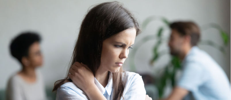 Stressed woman sitting alone