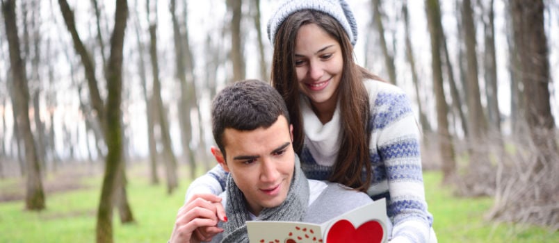 Couple reading valentine letter