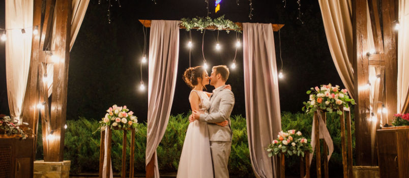 Wedding couple kissing each other