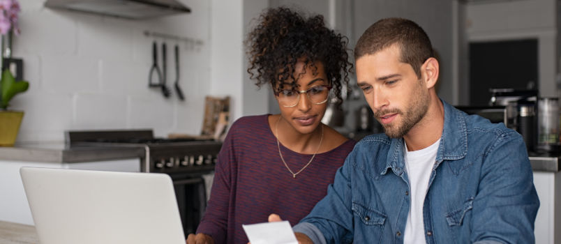 Couple checking bills
