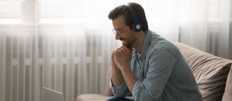 Happy man listening to music