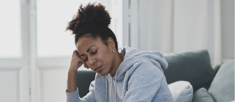 Depressed woman sitting alone