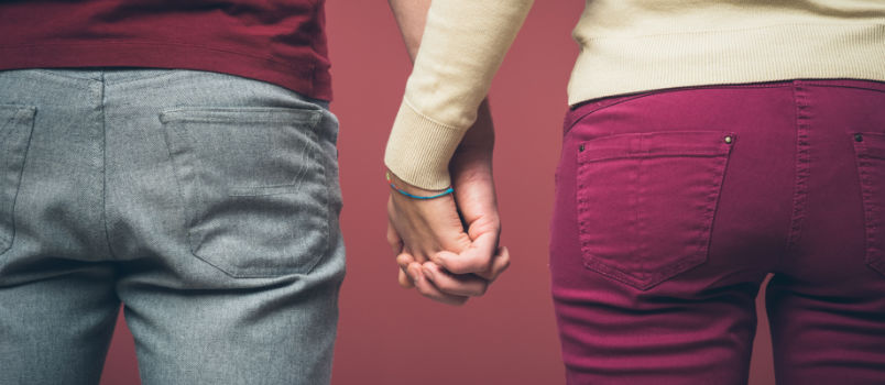 Young couple holding hands