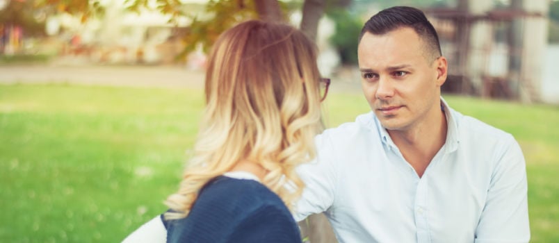 Couple talking outdoor in park