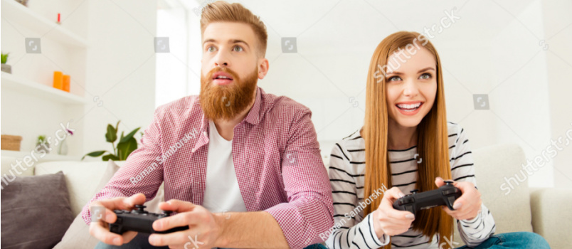 Happy couple playing game together