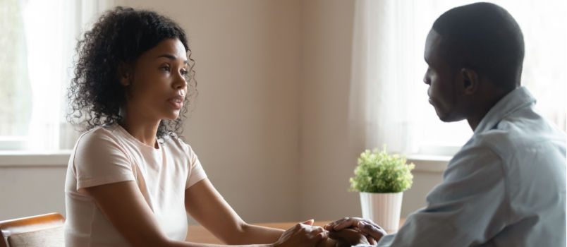 Happy couple confronting each other