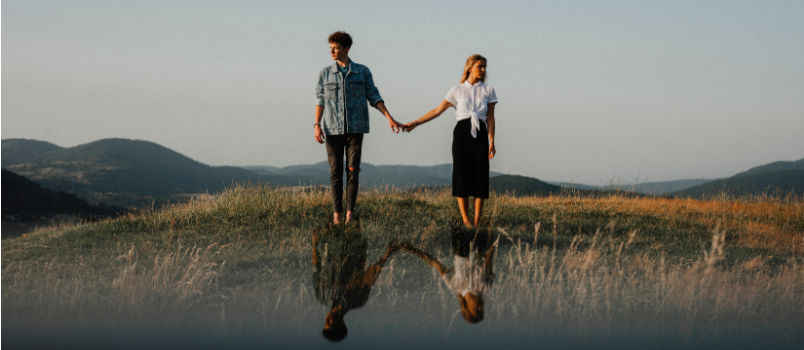 Young couple holding hands