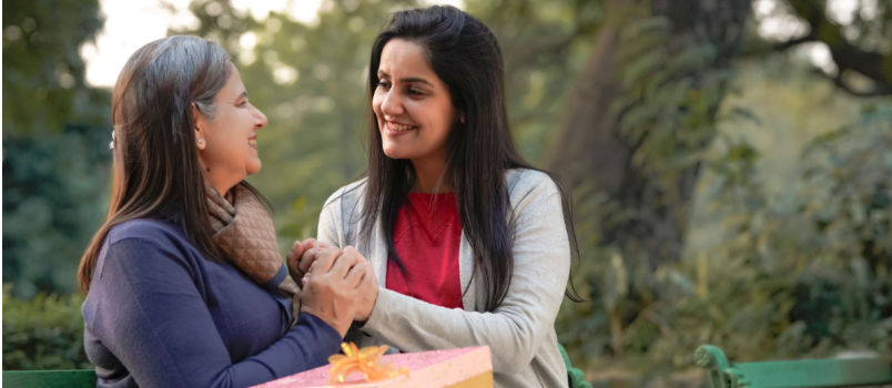 Woman surprising senior