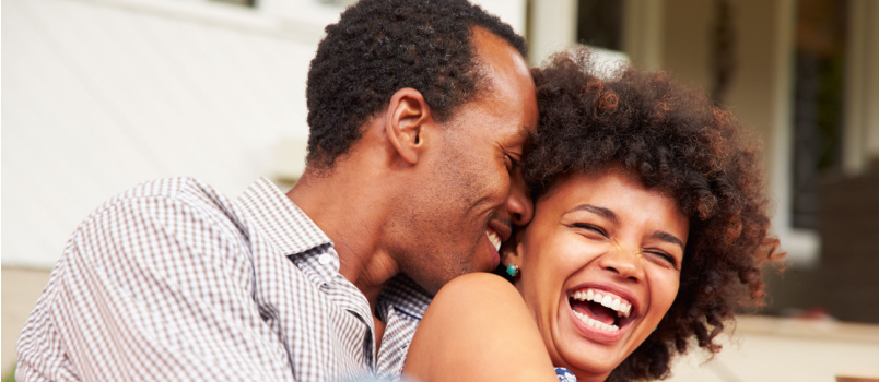 Happy couple cuddling