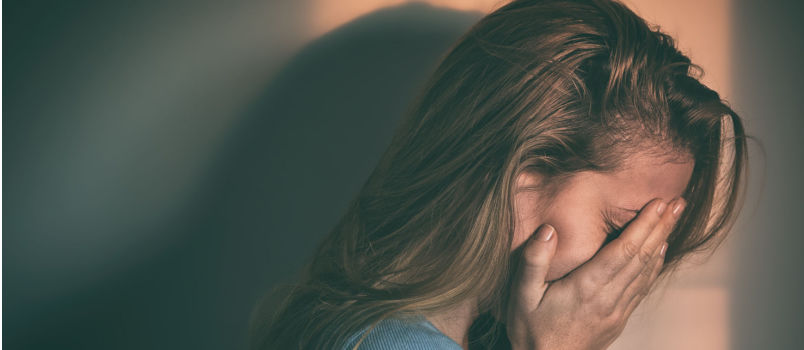 depressed woman crying alone