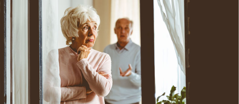 Sad woman not listening to man