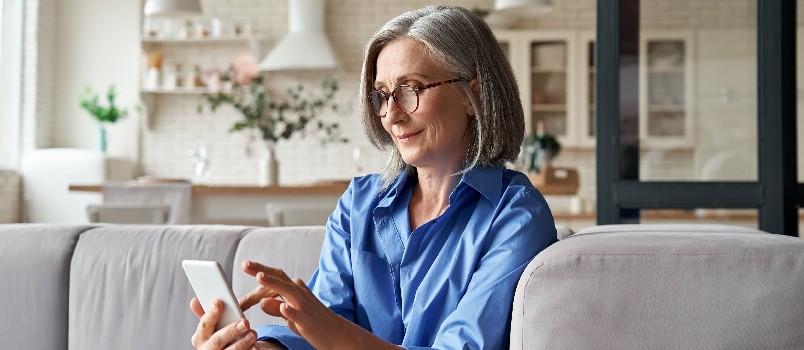 Old woman using smartphone
