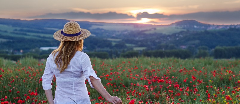 Woman standing enjoying sunset