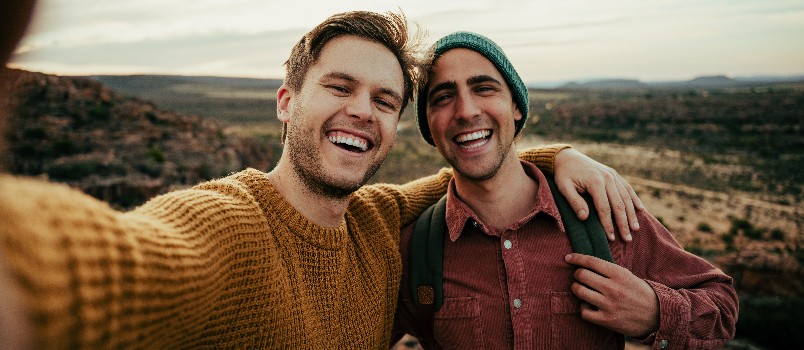 Friends taking selfie while hiking