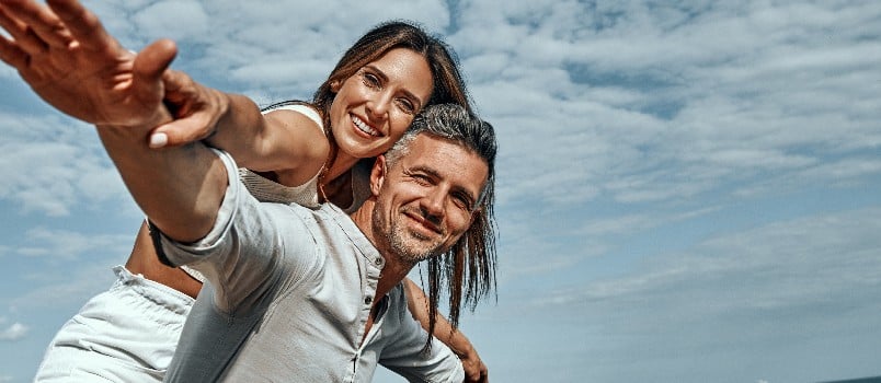 Young couple enjoying at beach