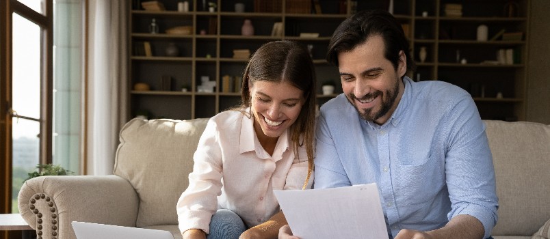 Happy couple managing household