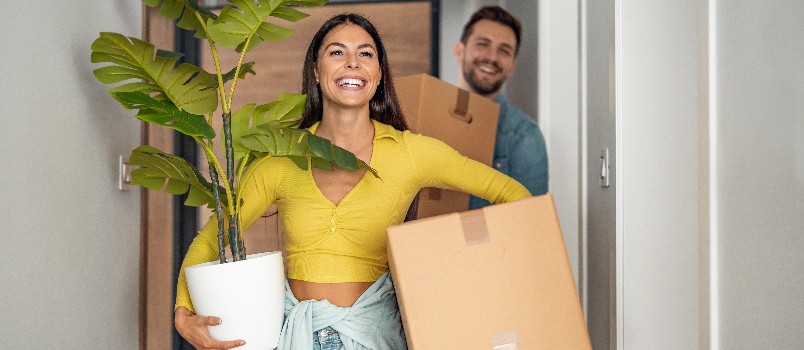 Young couple moving into new home