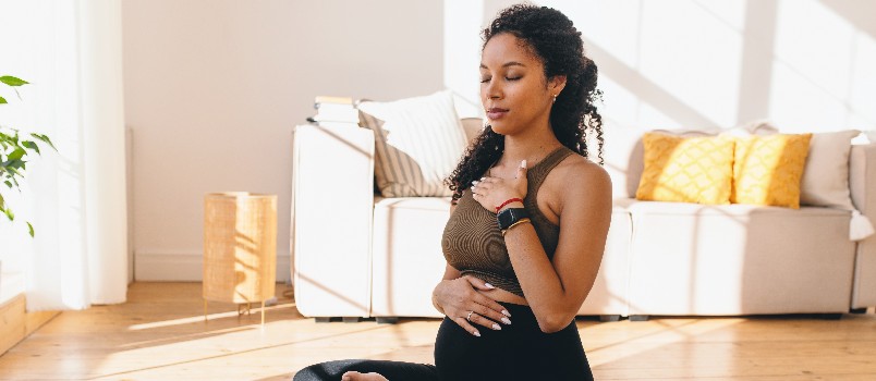 Pregnant woman doing yoga
