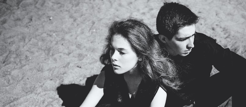 Young couple sitting together