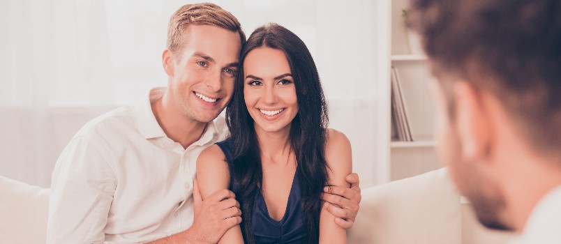 Young happy couple on family reception