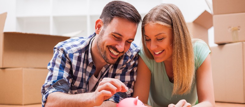 Young couple saving money