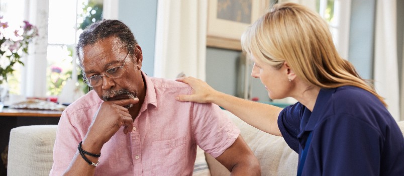 Support worker visit old man