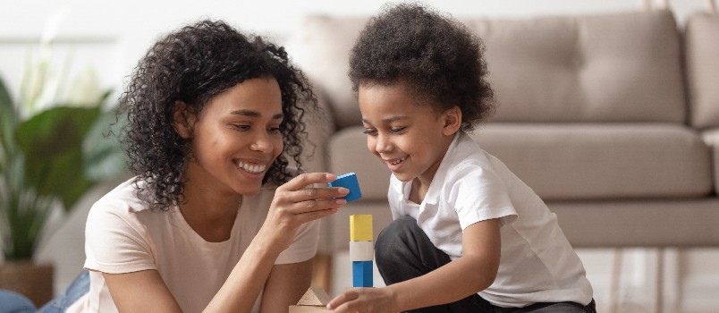 Mother and baby playing together