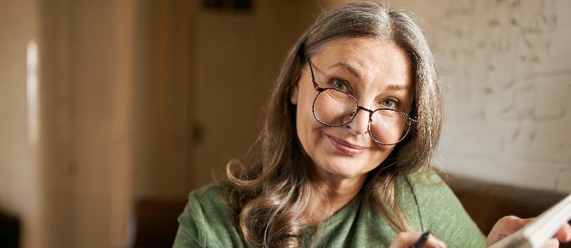 Old woman reading book