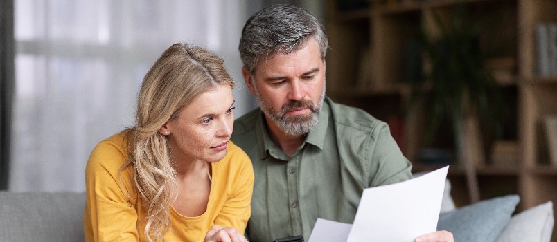Middle age couple planning budget