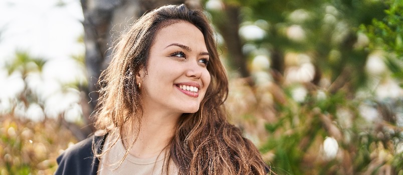 Young confident woman smiling