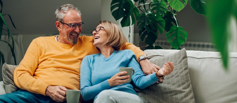 Elder couple hugging each other