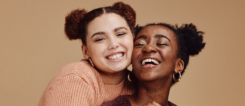 Happy lesbian couple hugging