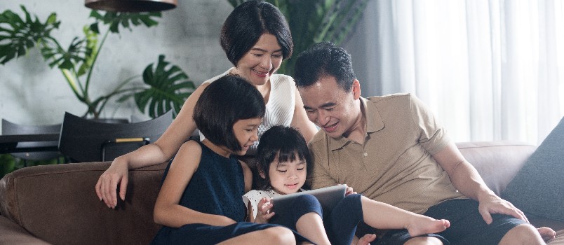 Happy family using tablet