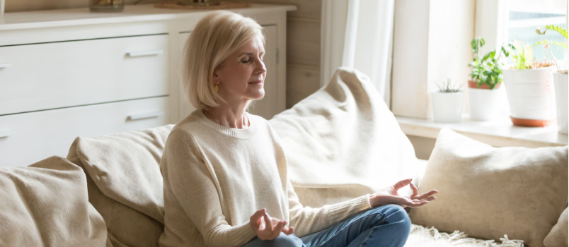 Old woman practicing yoga