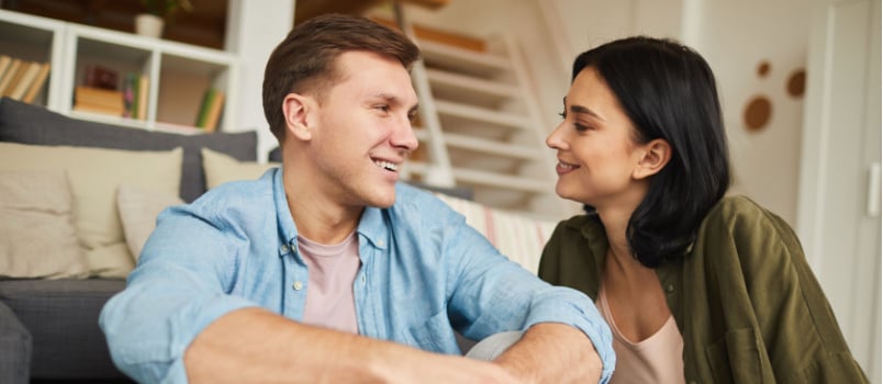 Young modern couple talking to each other