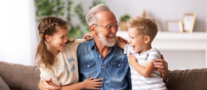 Grandpa hugging grandchild